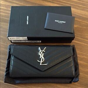 Saint Laurent Quilted Black Leather Clutch